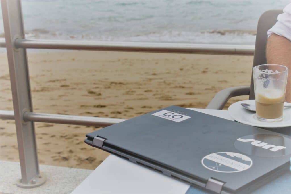 Remote work laptop beach